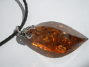 Amber jewelry - amber pendants for sale. We have various styles of amber pendants: heart shaped amber pendants, cross shape amber pendants, with and without sterling silver mounts.